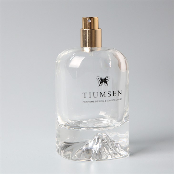 perfume bottle with legs on top